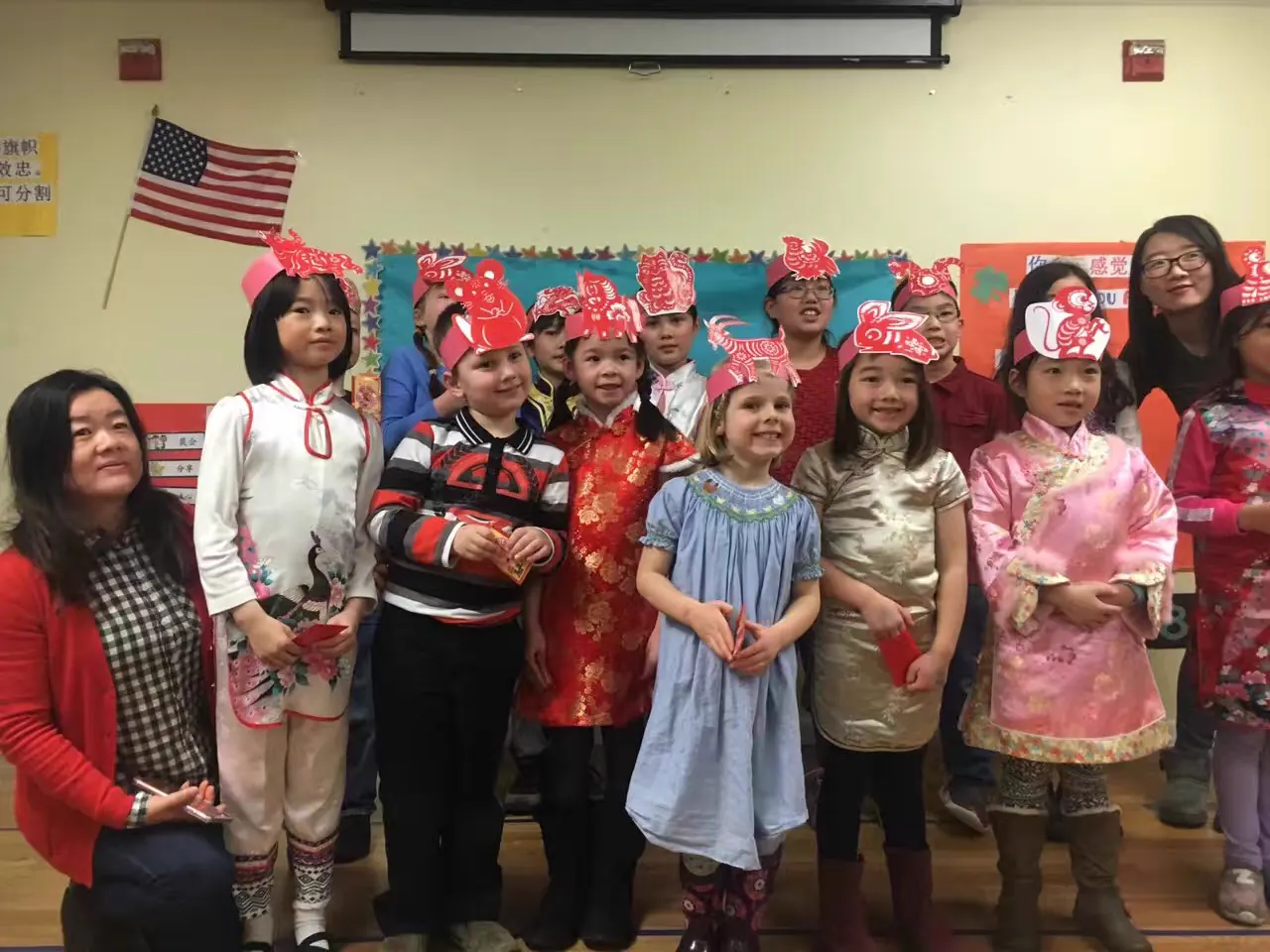 APLS students in traditional dress celebrating Lunar New Year