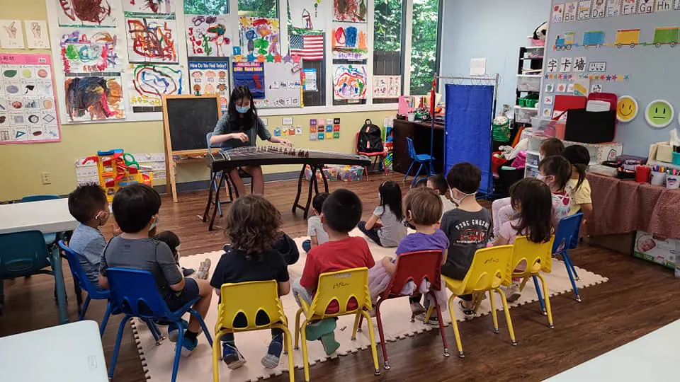 APLS students playing Chinese musical instruments